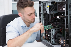 computer engineer fixing                         computer problem